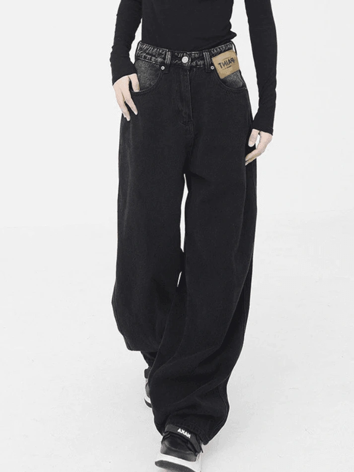 Boyfriend jeans noir vintage : l'éternel denim rebelle, un look délavé irrésistible.